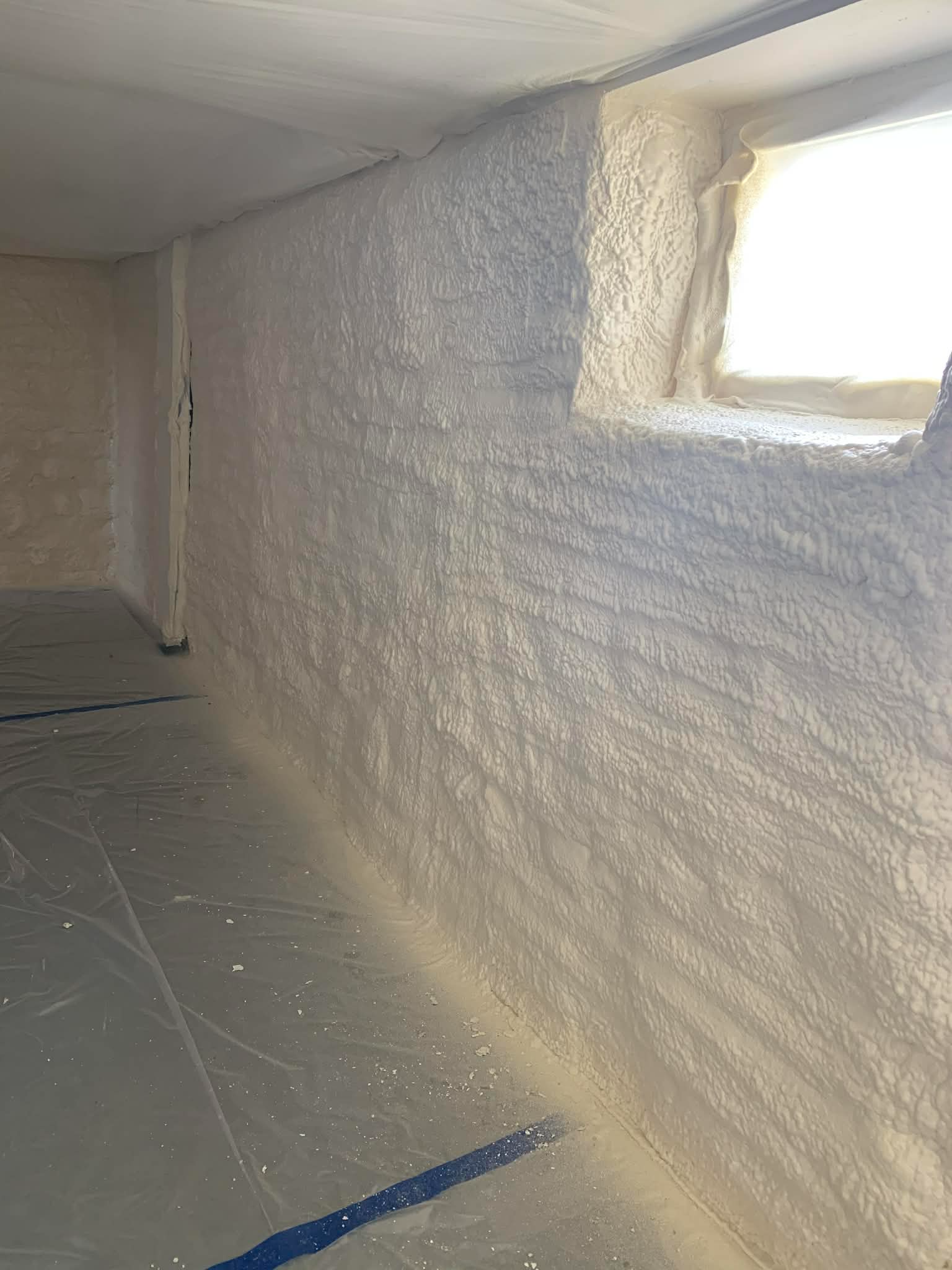 Box sill foam insulation at foundation